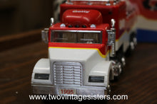 Load image into Gallery viewer, 1995 Getty Toy Race Car Carrier Limited Edition