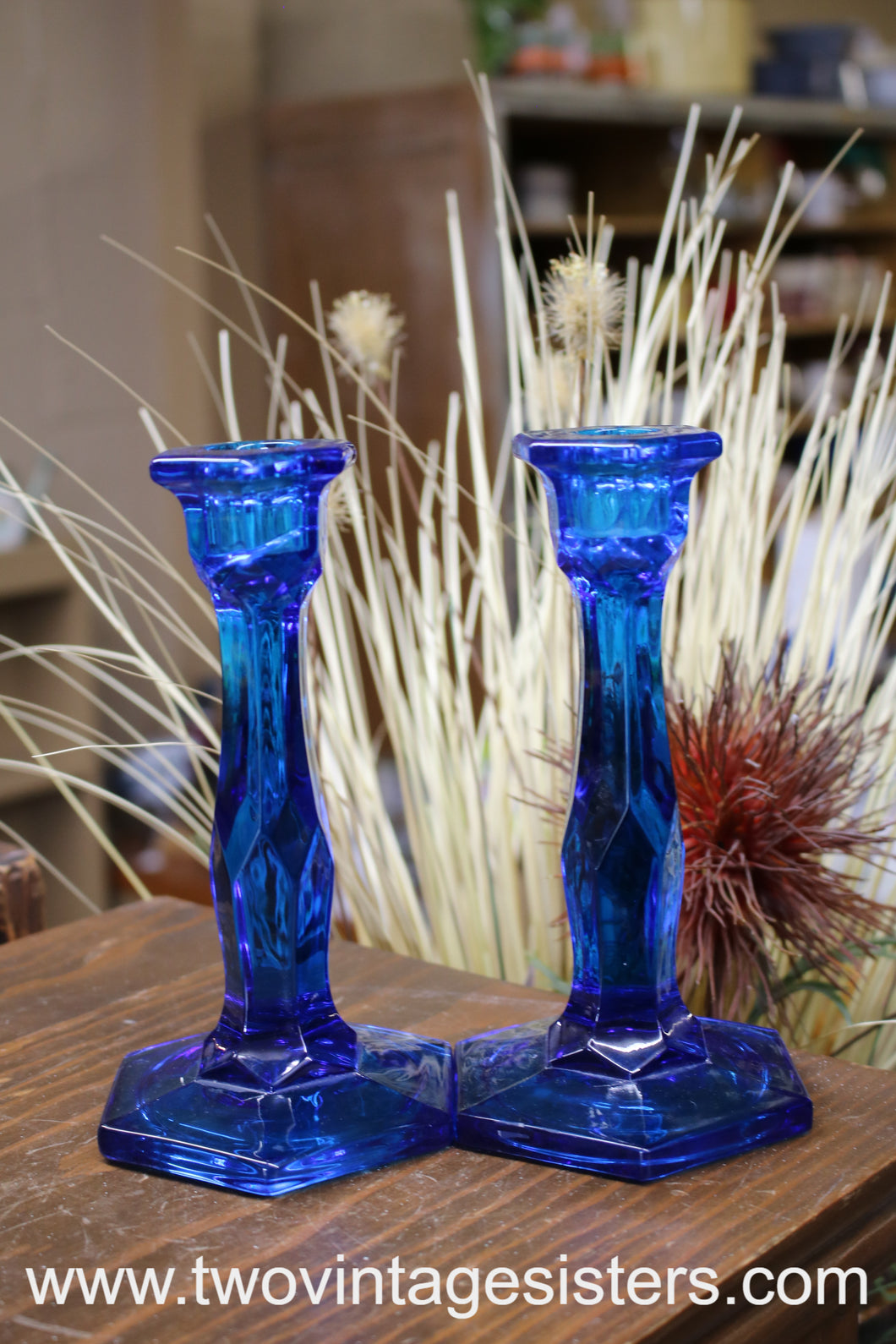 Cooperative Flint Blue Glass Candleholders Pair