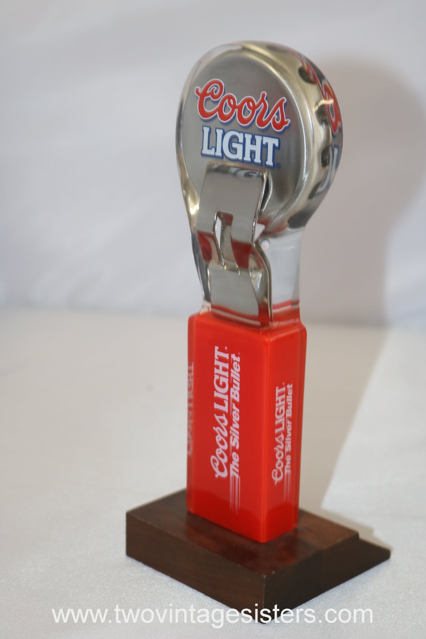 https://www.twovintagesisters.com/cdn/shop/products/CoorsLight-TheSilverBullet-BottleOpener-BeerTap_1_1024x1024@2x.jpg?v=1663018278